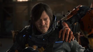 Death Stranding 2 trailer screenshot showing Sam Bridges in close up with robotic arm on his shoulder