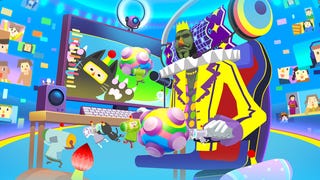 Katamari Damacy artwork showing surreal scene of colourful king in a seat sat a computer desk