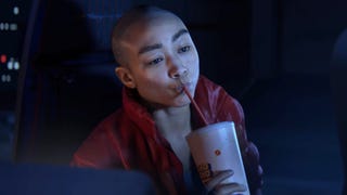 Tati Gabrielle sipping a drink as bounty hunter, Jordan A. Mun in Intergalactic The Heretic Prophet